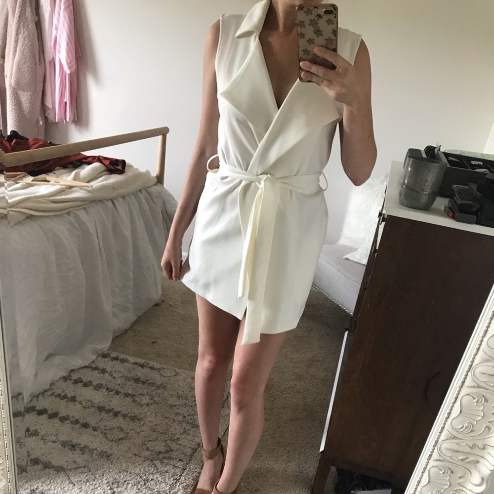 Cream colored tie front vest